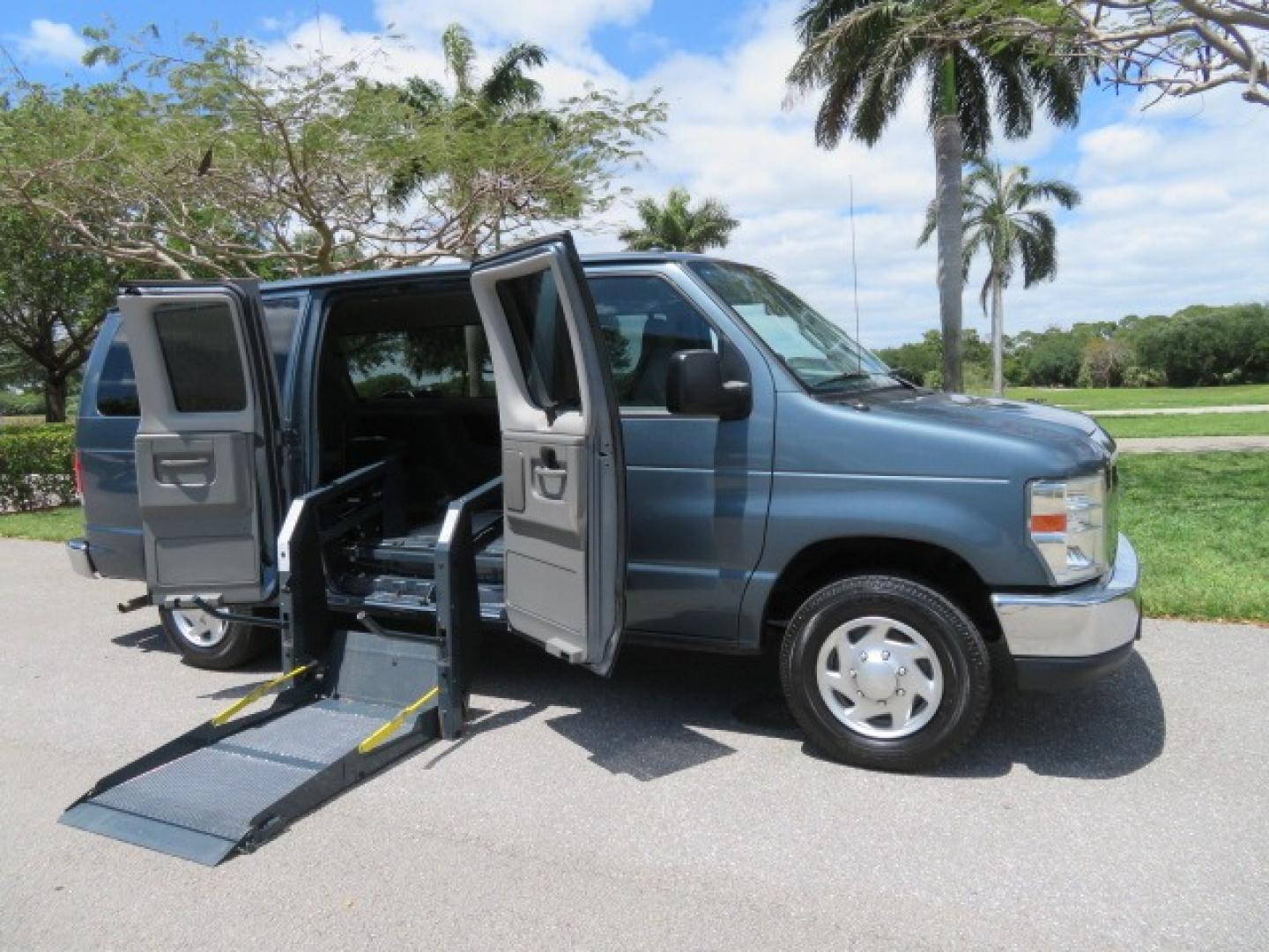 2013 Dark Blue /Gray Ford E-Series Wagon XLT (1FMNE1BW4DD) with an 4.6L V8 engine, Automatic transmission, located at 4301 Oak Circle #19, Boca Raton, FL, 33431, (954) 561-2499, 26.388861, -80.084038 - You are looking at a Gorgeous 2013 Ford E150 XLT Handicap Wheelchair Conversion Van with 22K Original Miles, Tie Down System, Power Electric VMI Side Entry Wheelchair Lift, Back Up Camera, Factory Navigation and Much Much More. This van is Awesome. This is a Nice Rust Free Van with a Clean Carfax, C - Photo#42